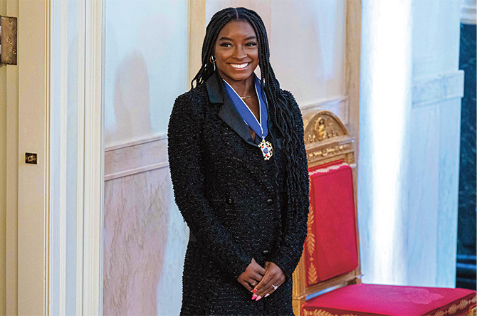 Enlargeable photo of Simone Biles wearing the Presidential Medal of Freedom