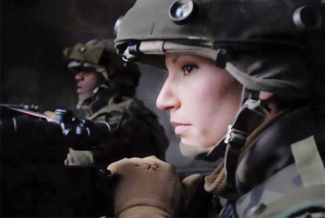A man and a woman in the military